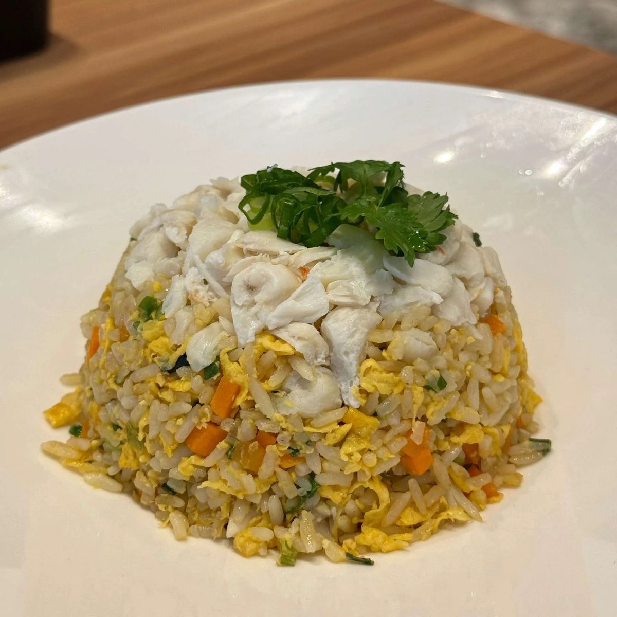 Fried rice topped with crab meat at 2GATHER