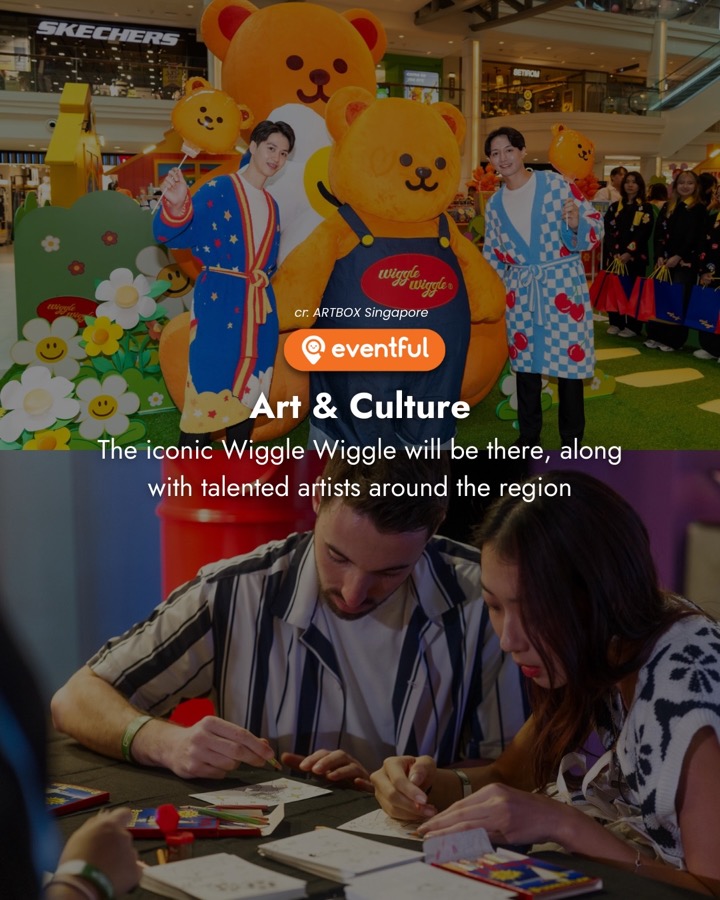 Wiggle Wiggle bear mascot at a promotional event, above two visitors drawing at a workshop table