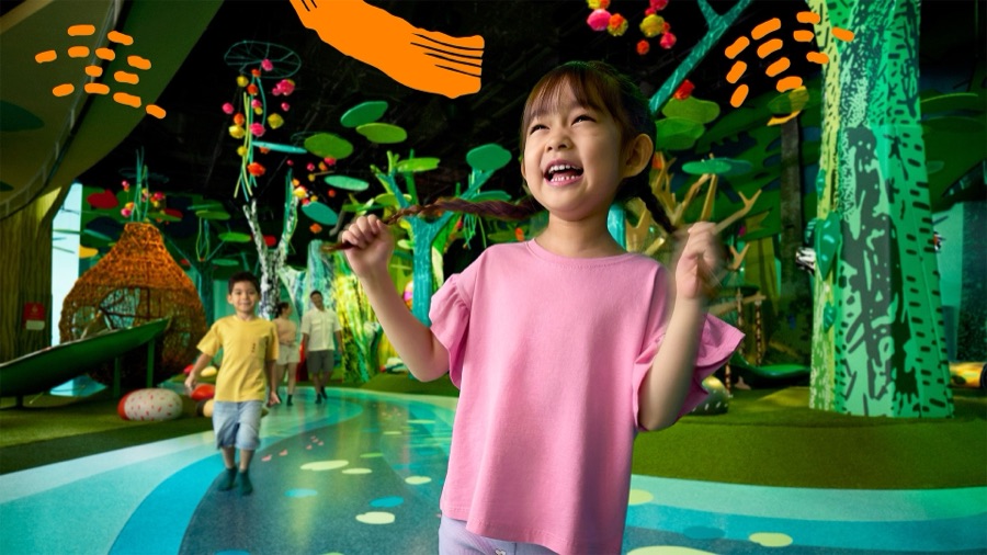 Children exploring the indoor forest playscape at Curiosity Cove, Mandai Wildlife East