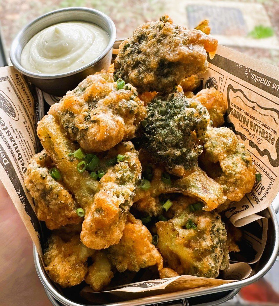 Fried broccoli with wasabi mayo in a mess tin at NOMADS