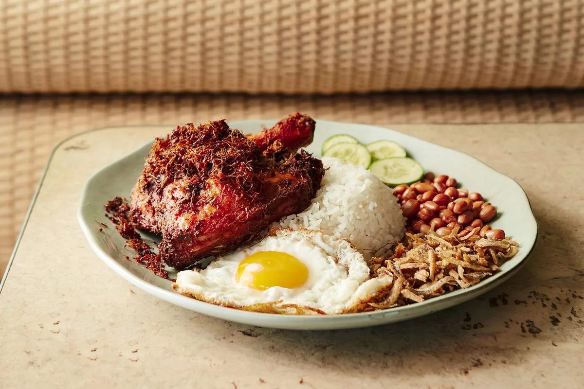 Nasi lemak with fried chicken and egg at The Coconut Club, a Bib Gourmand restaurant