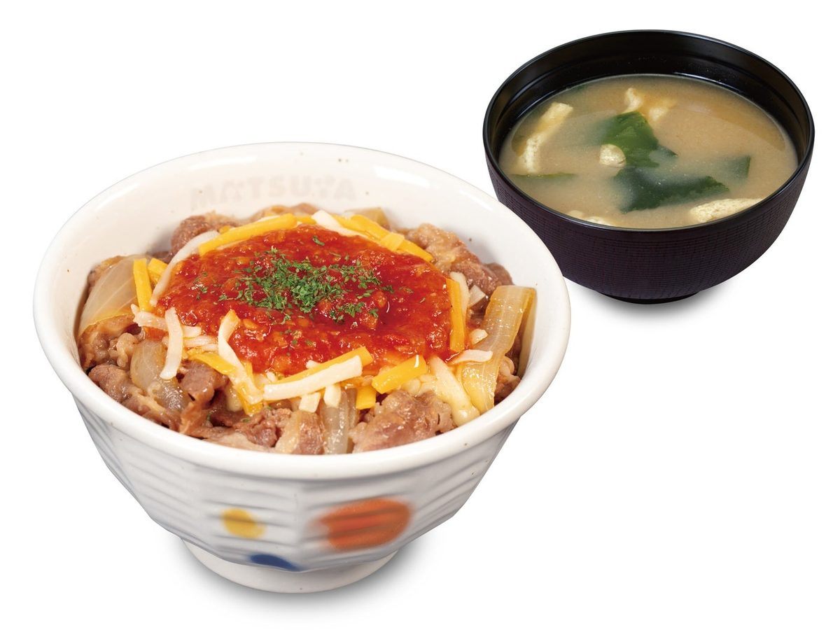 A Matsuya gyumeshi beef bowl topped with tomato sauce and cheese, with miso soup, from Matsuya's Japan menu