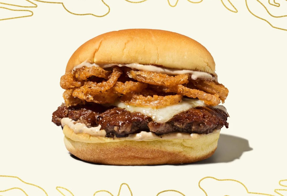 Shake Shack White Truffle Burger with crispy onions on a potato bun