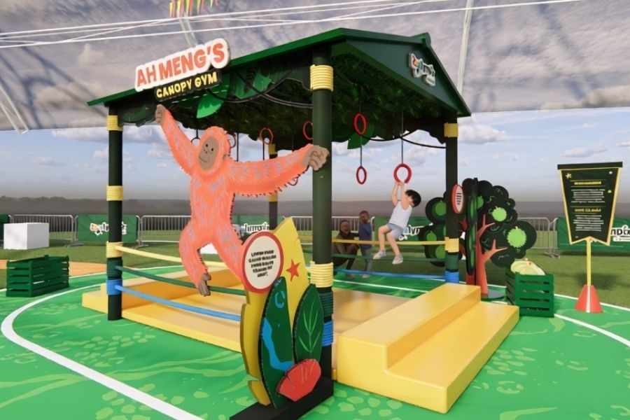 A child on the rings at Ah Meng's Canopy Gym challenge in Mandai's Zoolympix Village