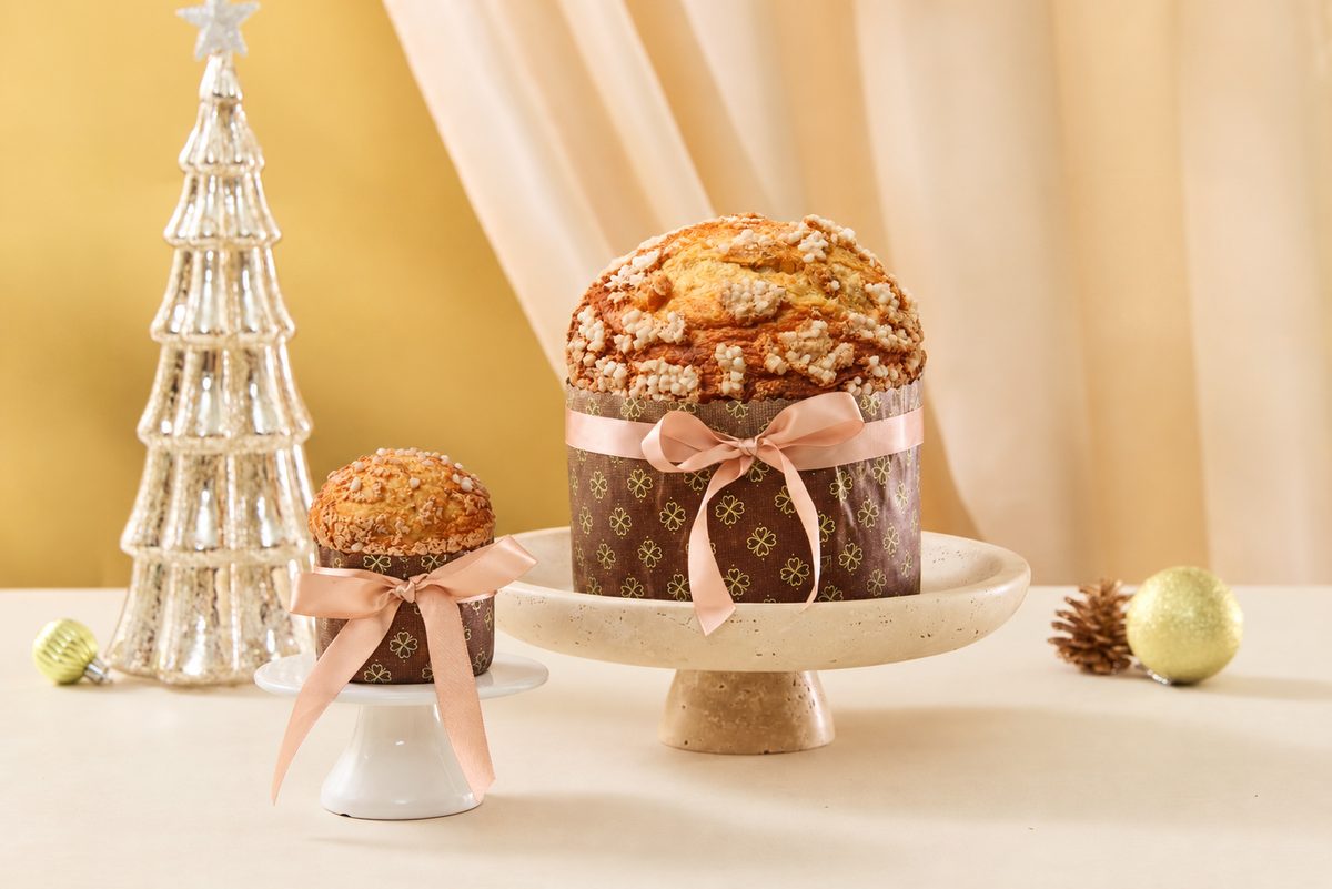 The Fullerton Classic Panettone with a ribbon on a cake stand
