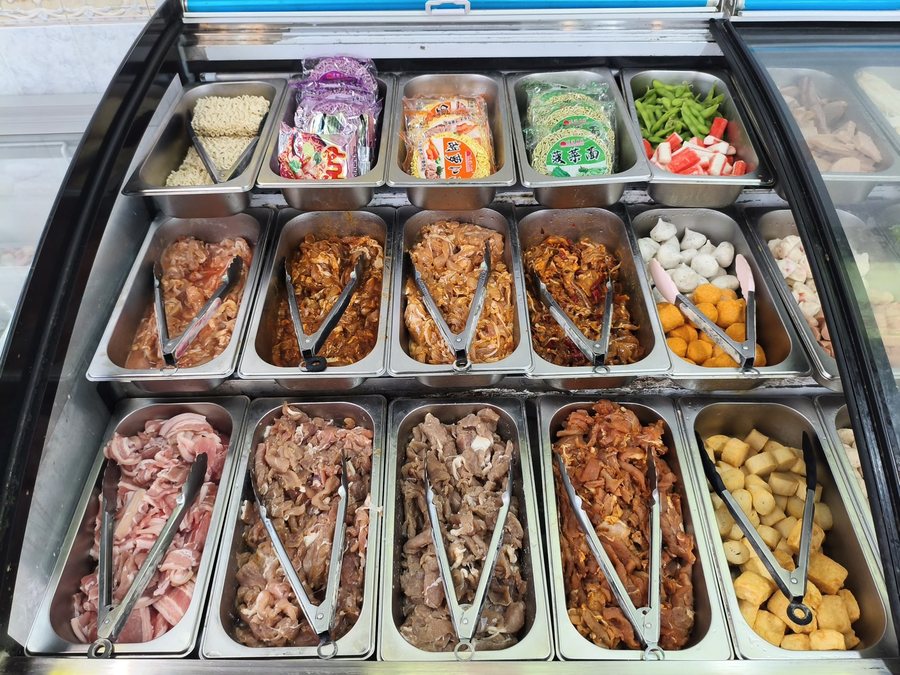 The marinated meat counter at Family Mookata
