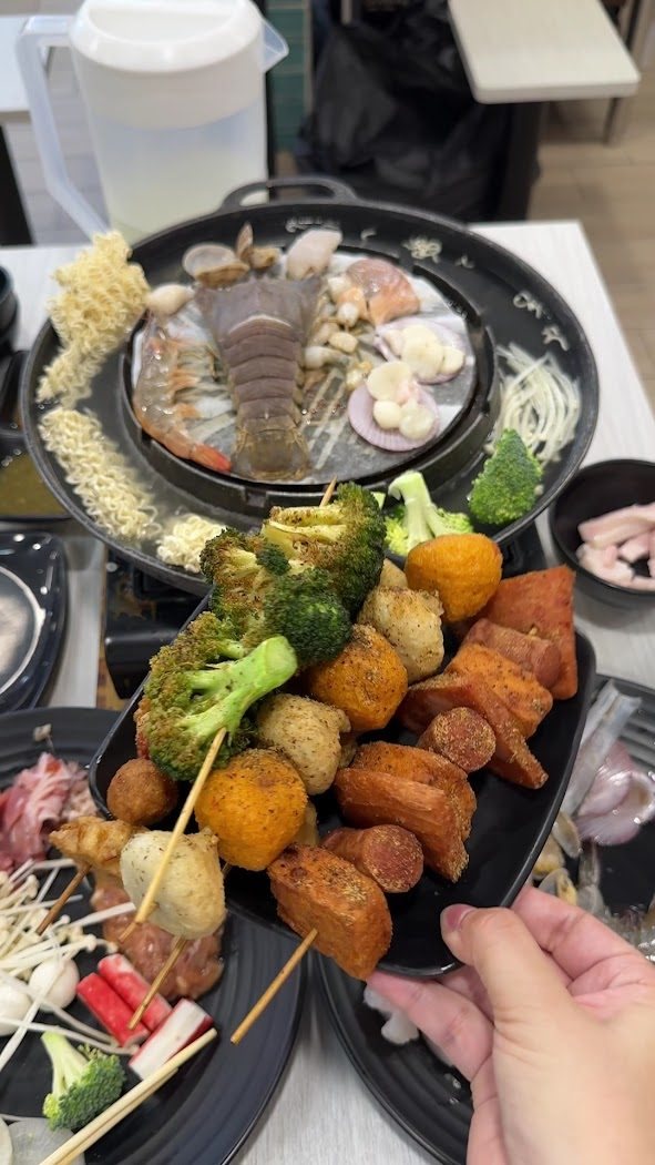 Lok lok skewers and baby lobster, on the house