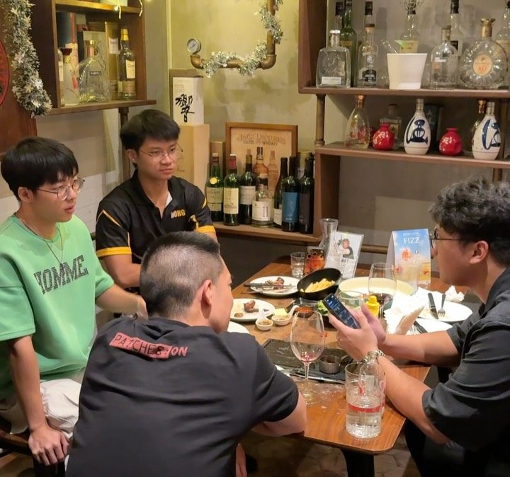 Guests talking at a table during Eventful's TikTok views event at WLJK