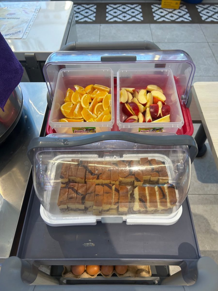 Fruit and cake on the dessert counter at Family Hakata