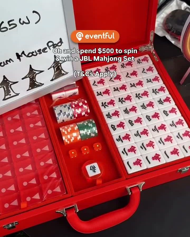 JBL-branded mahjong set in a red case, the top prize on the spin wheel at the warehouse sale