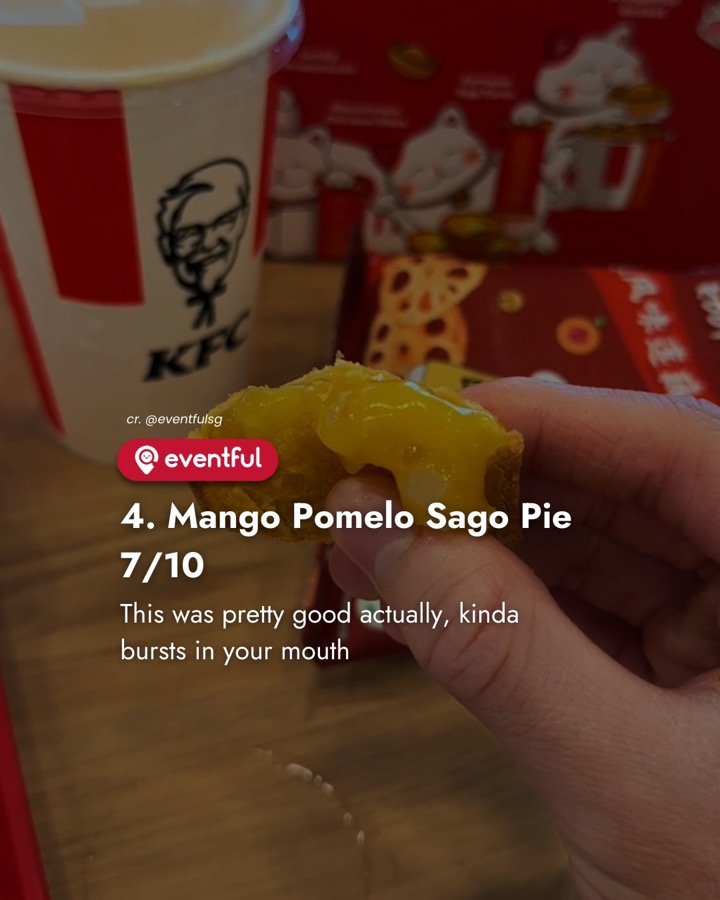 A bitten KFC Mango Pomelo Sago Pie with yellow filling
