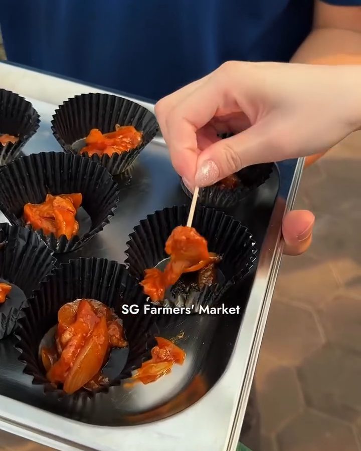 Food samples in small cups at the SG Farmers' Market booth at NHG Healthiverse