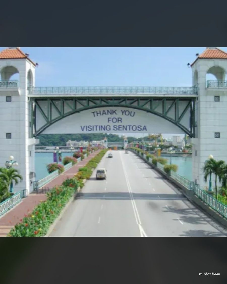The old 'Thank you for visiting Sentosa' arch over the causeway road leaving the island