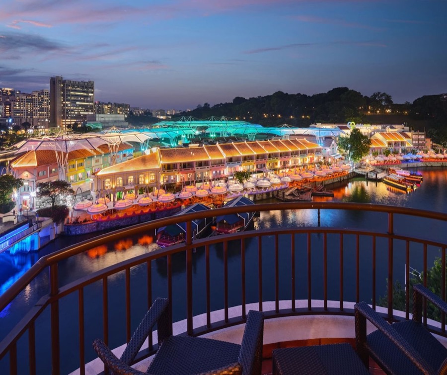 Night view of Clarke Quay from a balcony room at Paradox Singapore Merchant Court