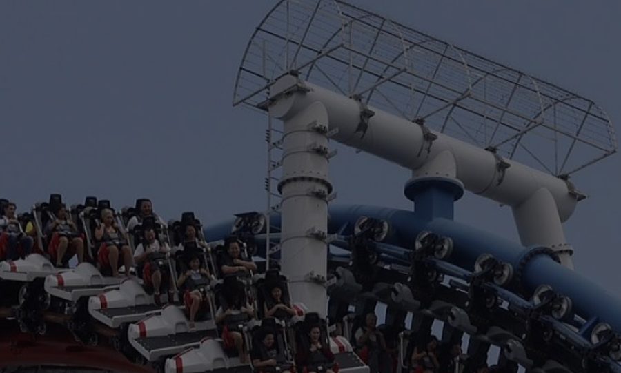 A roller coaster mid-drop at Universal Studios Singapore