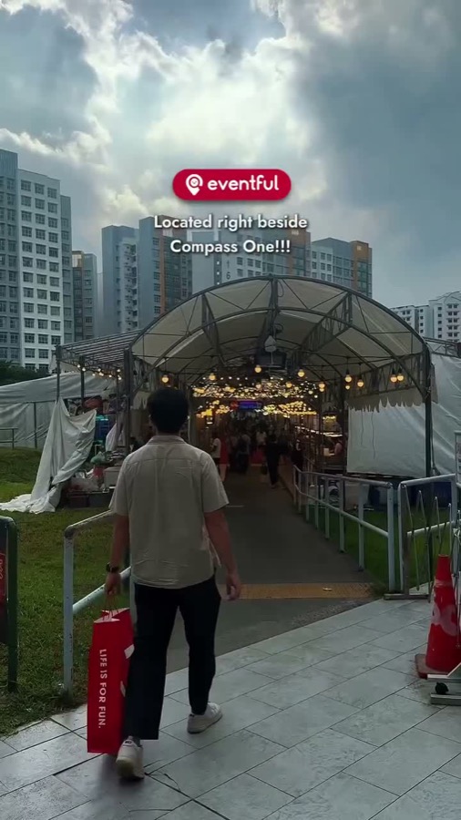 Covered walkway entrance to the Sengkang pasar malam tent beside Compass One