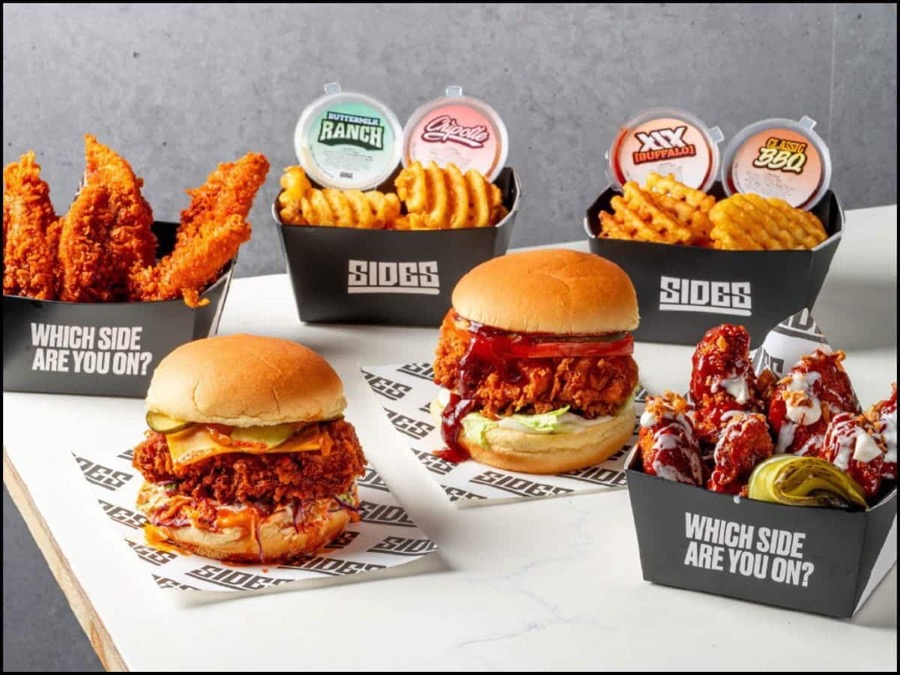 SIDES tenders, waffle fries, burgers and wings in black SIDES boxes