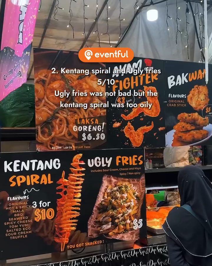 Kentang spiral and ugly fries stall menu board at the Simei pasar malam with our 5/10 score on screen
