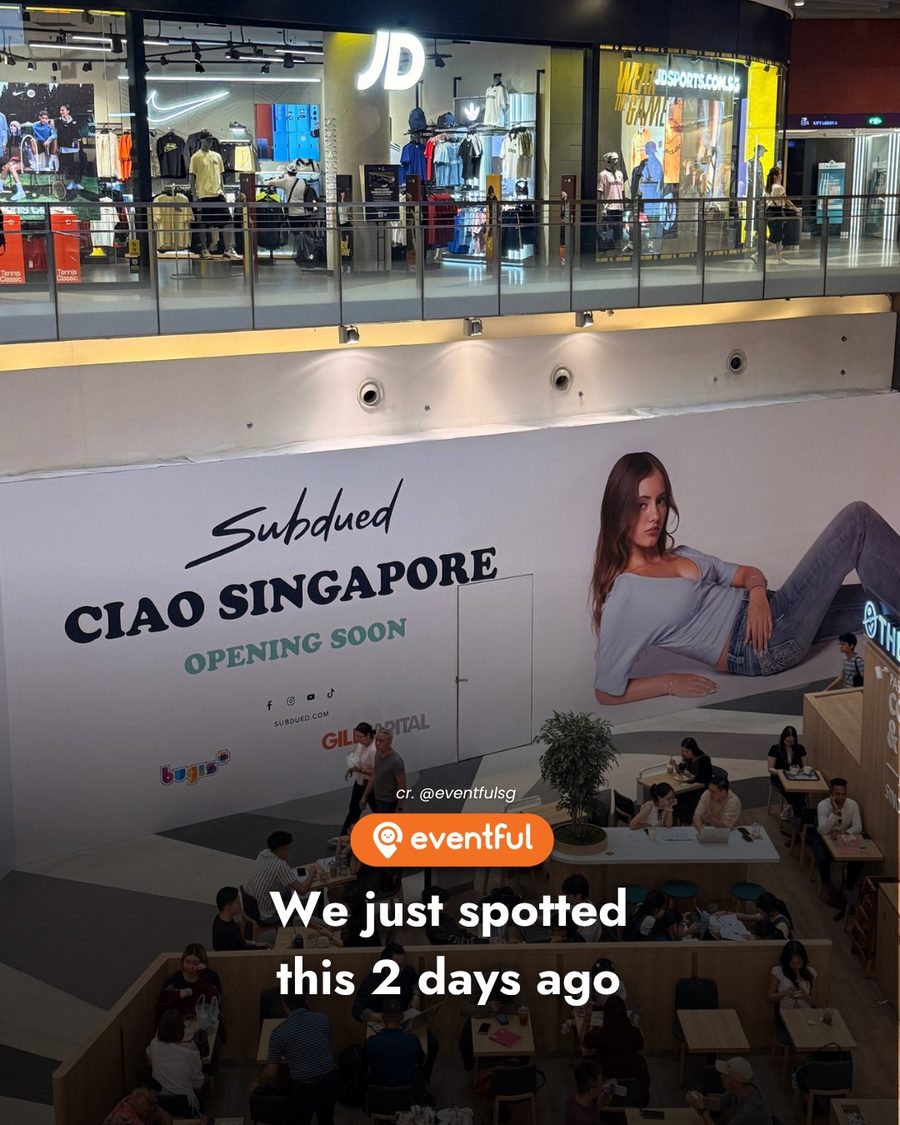 Subdued Ciao Singapore opening soon hoarding on level 1 of Bugis+