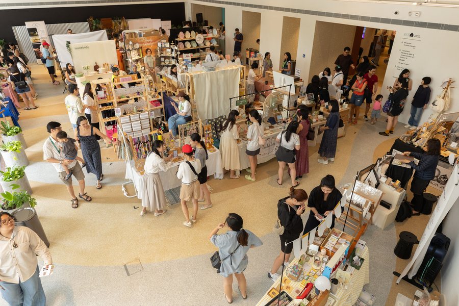 Shoppers browsing local brand stalls at the GREEN-HOUSE Festival in Singapore