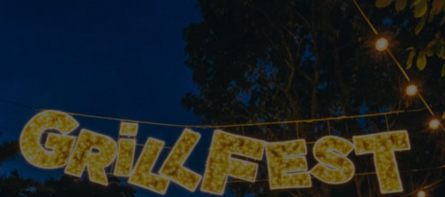 The Sentosa GrillFest entrance sign lit up at night